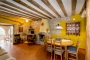 Living / dining with doors opening to terrace